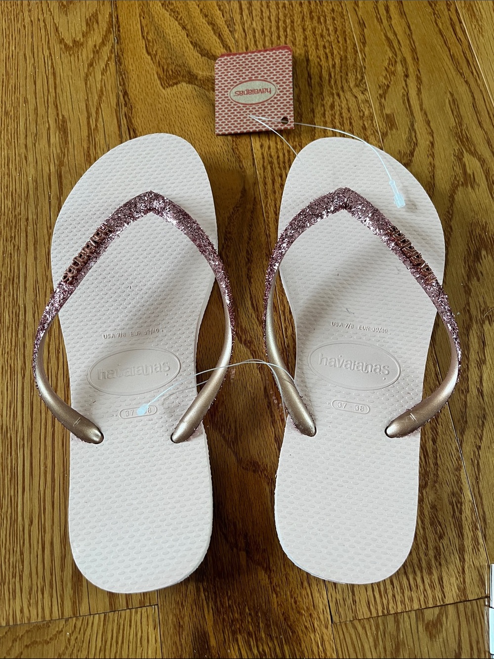 Havaianas Women’s White Flip Flops with Rose Gold Glitter Straps